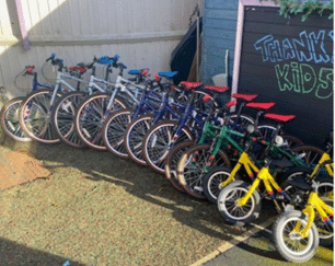 KidsOut Receives Generous Bike Donations from Team Tactics!